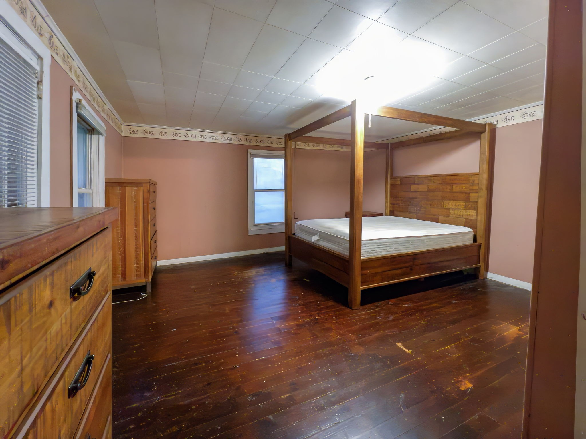 849 Jack Porter Road Lafayette, TN 37083 - Photo 33 of 56 a spacious bedroom with a bed and a table