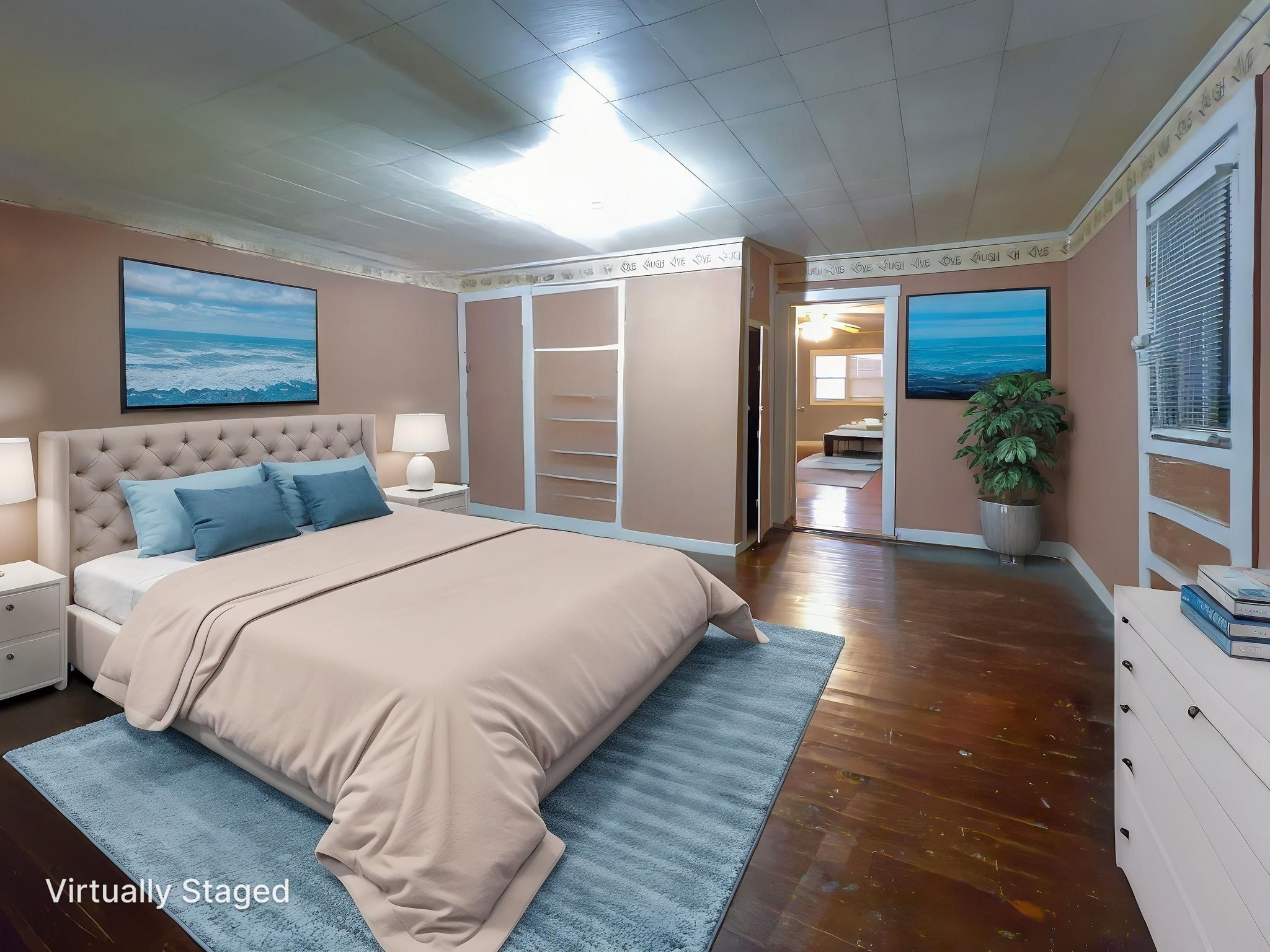 849 Jack Porter Road Lafayette, TN 37083 - Photo 37 of 56 a bedroom with a large bed and a wooden floor