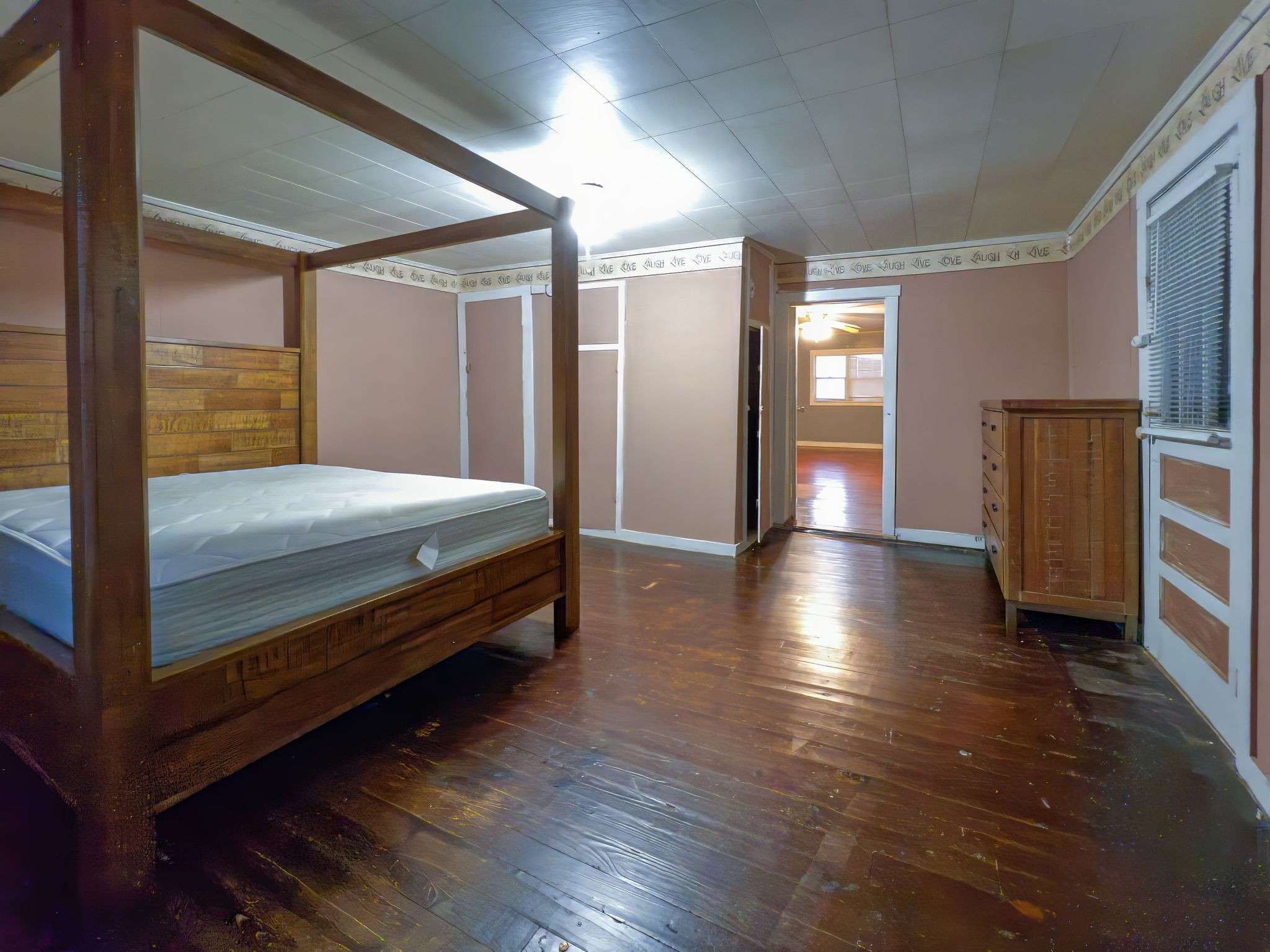 849 Jack Porter Road Lafayette, TN 37083 - Photo 38 of 56 a bedroom with bed and wooden floor