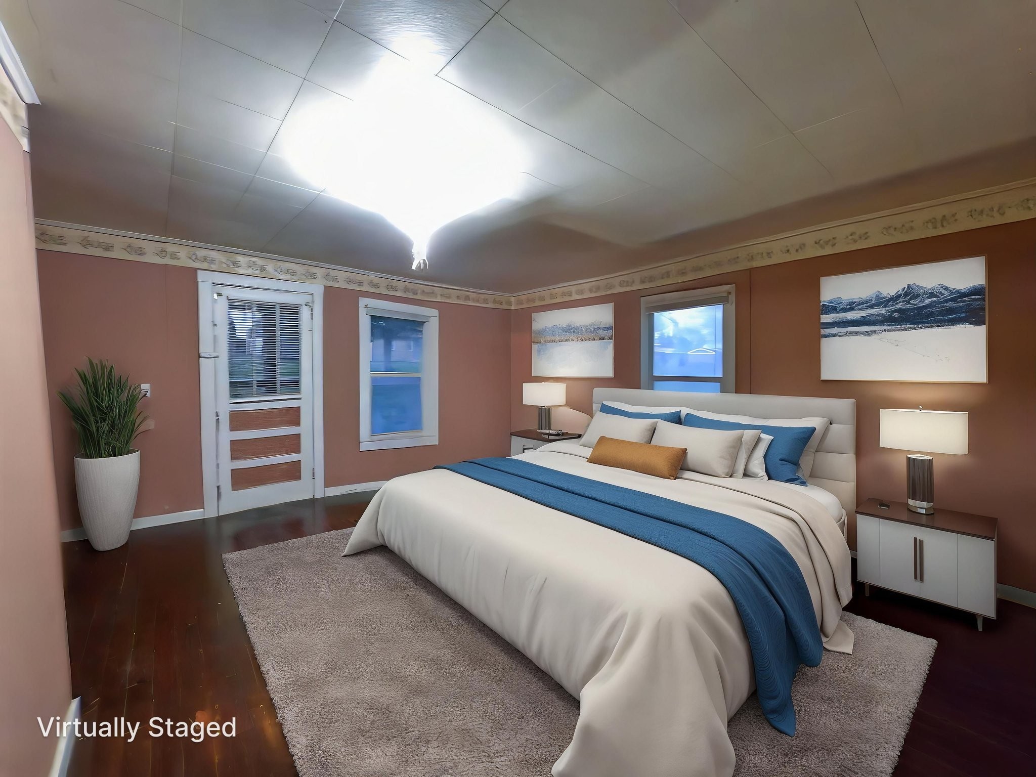 849 Jack Porter Road Lafayette, TN 37083 - Photo 40 of 56 a bedroom with a large bed and a potted plant