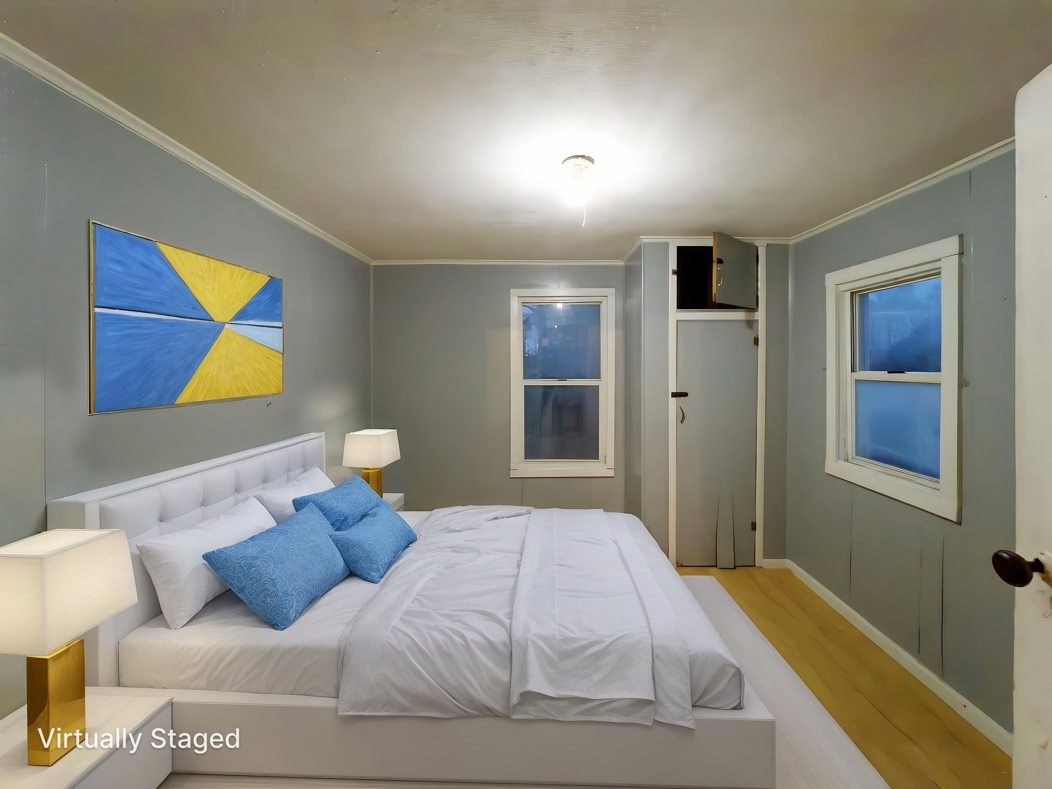 849 Jack Porter Road Lafayette, TN 37083 - Photo 45 of 56 a bedroom with a bed and painting on the wall