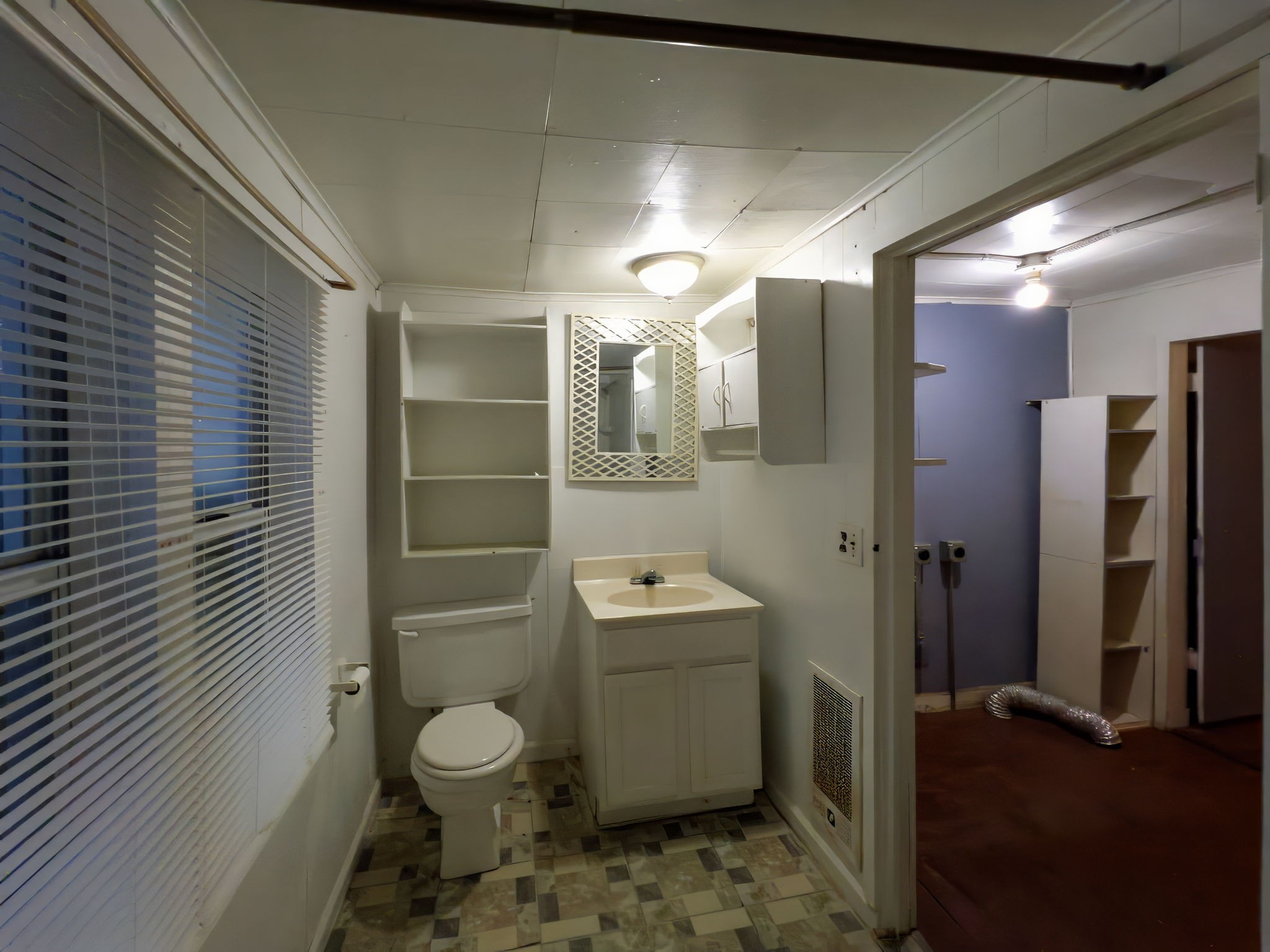 849 Jack Porter Road Lafayette, TN 37083 - Photo 51 of 56 a bathroom with a toilet a sink and shower