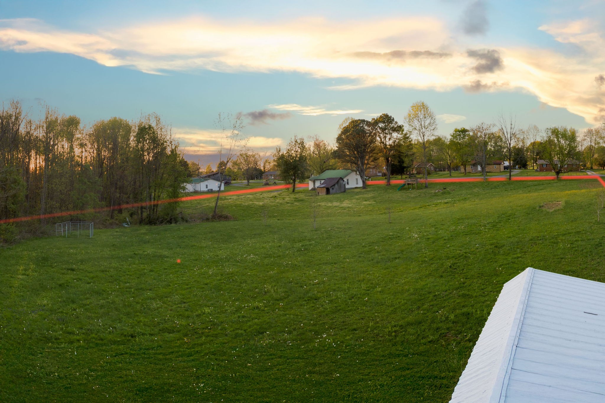849 Jack Porter Road Lafayette, TN 37083 - Photo 55 of 56 a view of a golf course with a lake