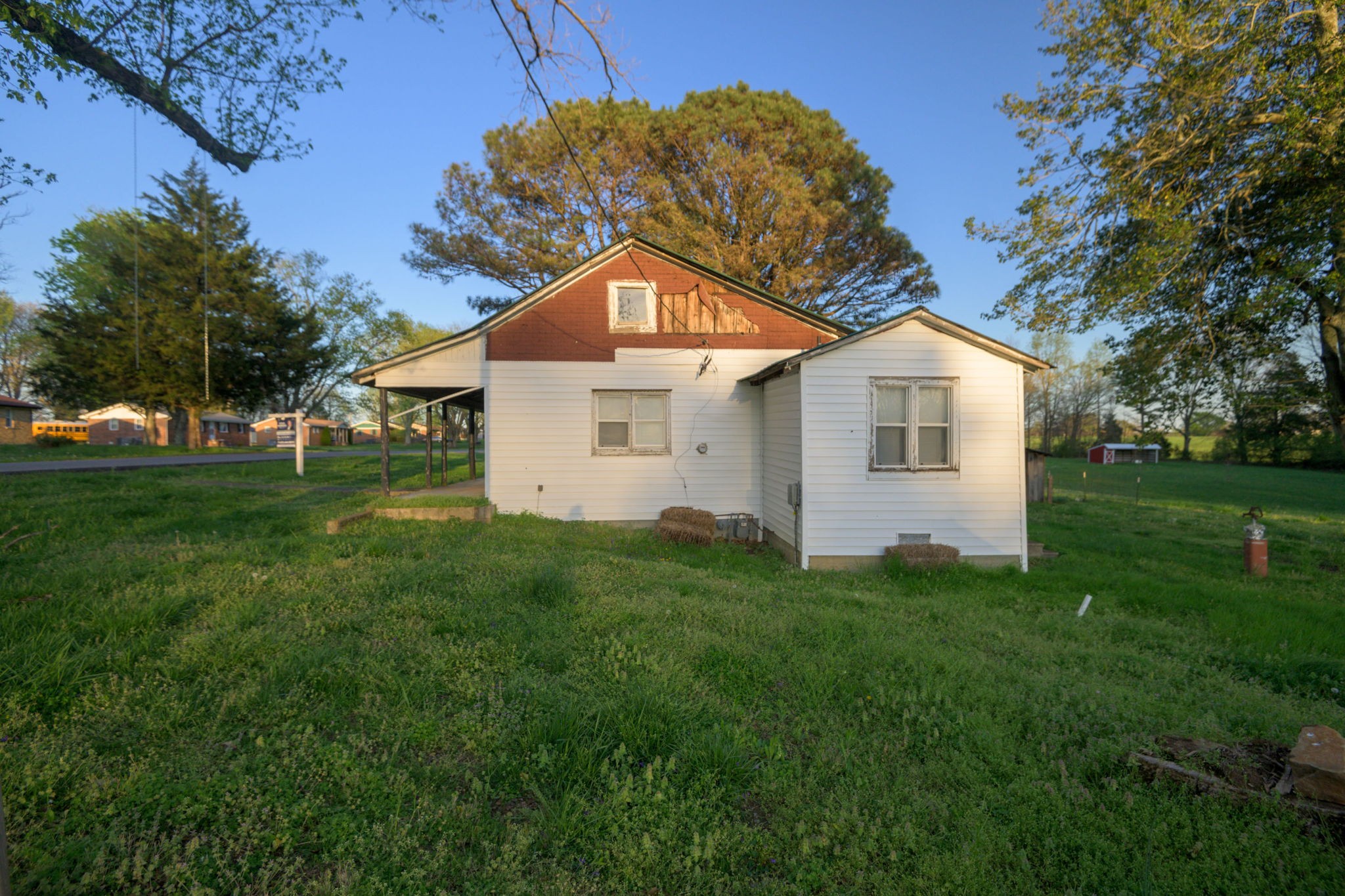 849 Jack Porter Road Lafayette, TN 37083 - Photo 7 of 56 a view of a house with a yard