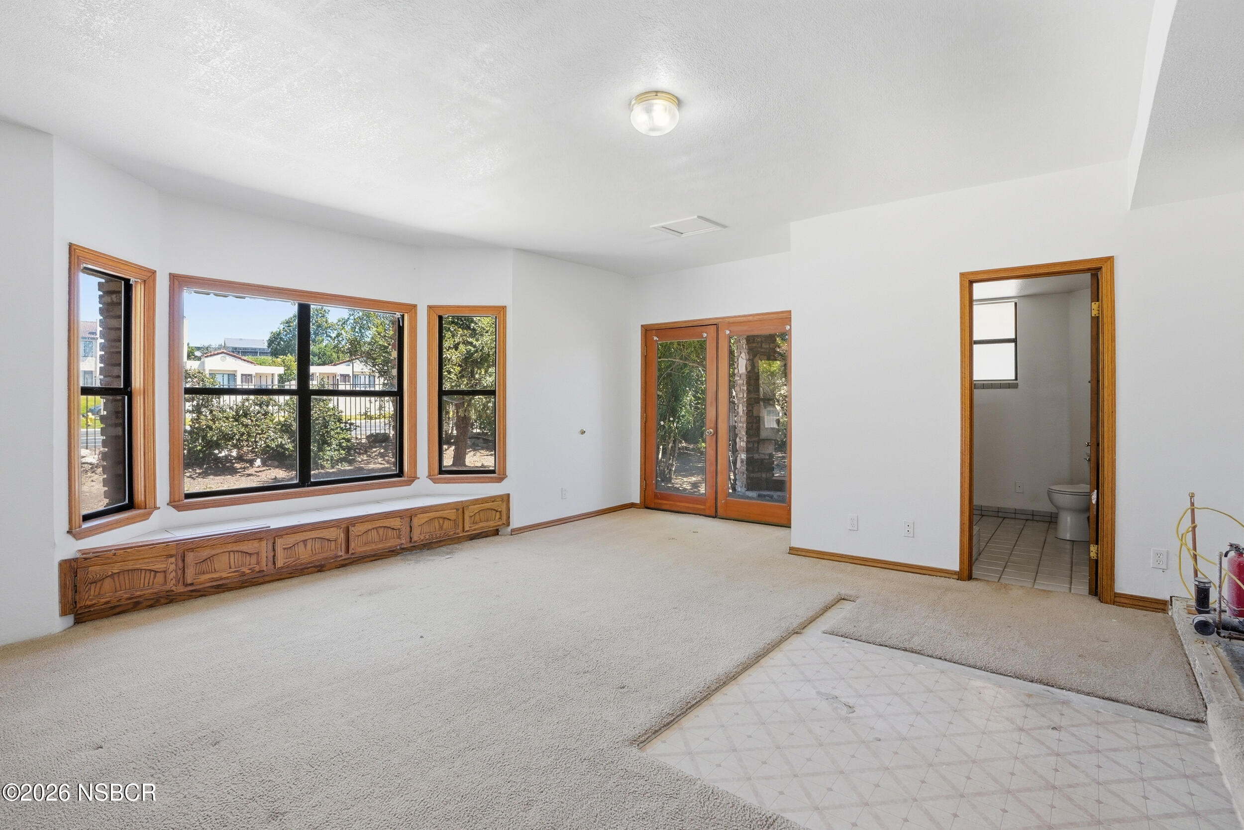 140 East Rice Ranch Road Santa Maria, CA 93455 - Photo 16 of 44 an empty room with windows and closet