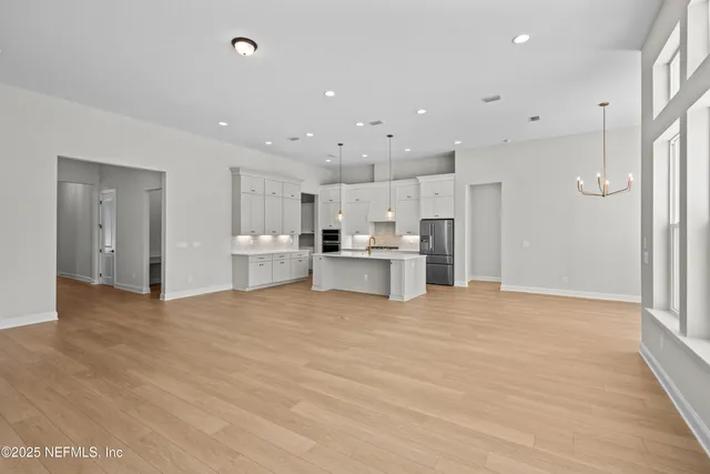 a picture of a wall with a white wall and white picture