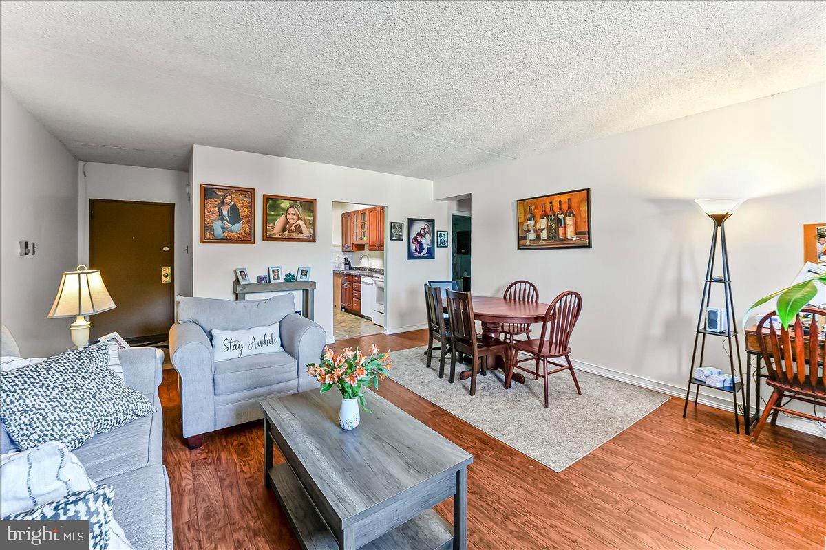 400 Glendale Road, Unit K52 Havertown, PA 19083 - Photo 3 of 17 a living room with furniture and wooden floor