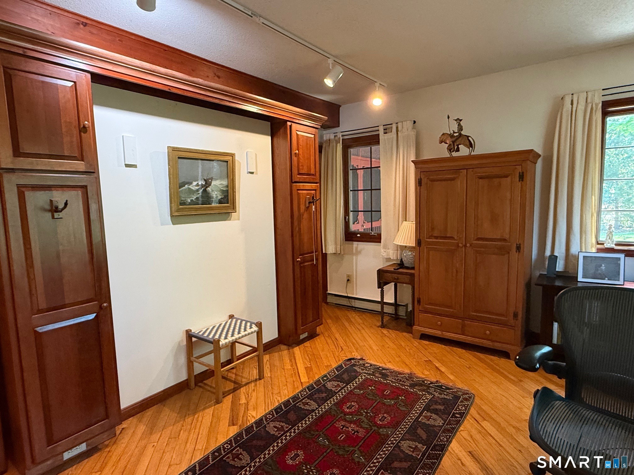 8 Ivy Road Stonington, CT 06355 - Photo 12 of 30 a view of a livingroom with furniture and a window
