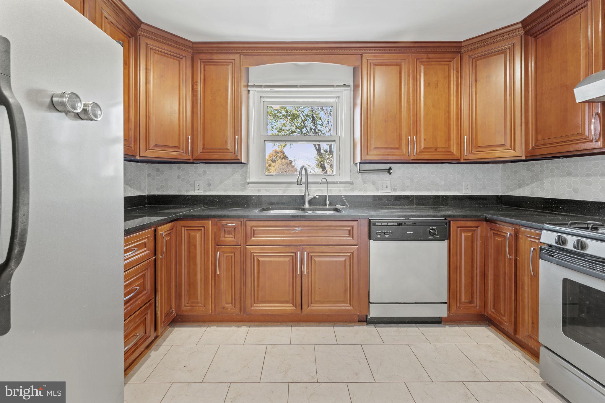 12118 Livingston Street Silver Spring, MD 20902 - Photo 11 of 42 Wrap-around kitchen