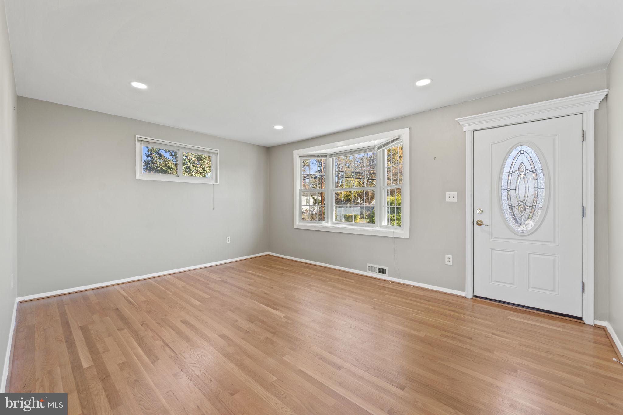 12118 Livingston Street Silver Spring, MD 20902 - Photo 5 of 42 Recess lights & hardwood flooring