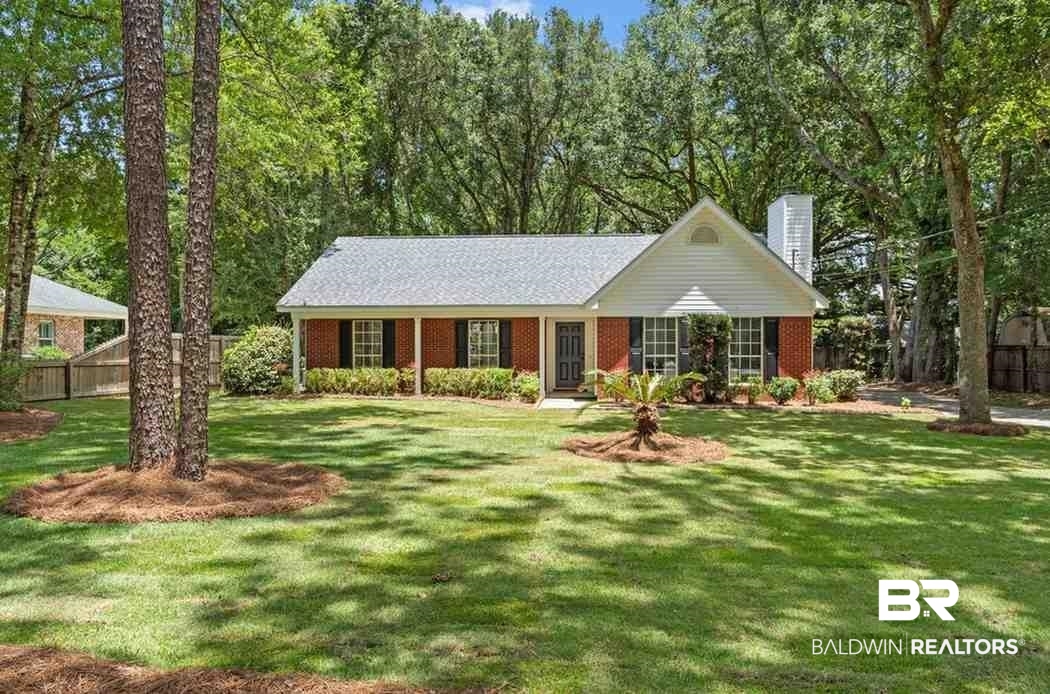 10251 Windmill Road Fairhope, AL 36532 - Photo 1 of 44 View of front facade featuring a chimney and brick siding