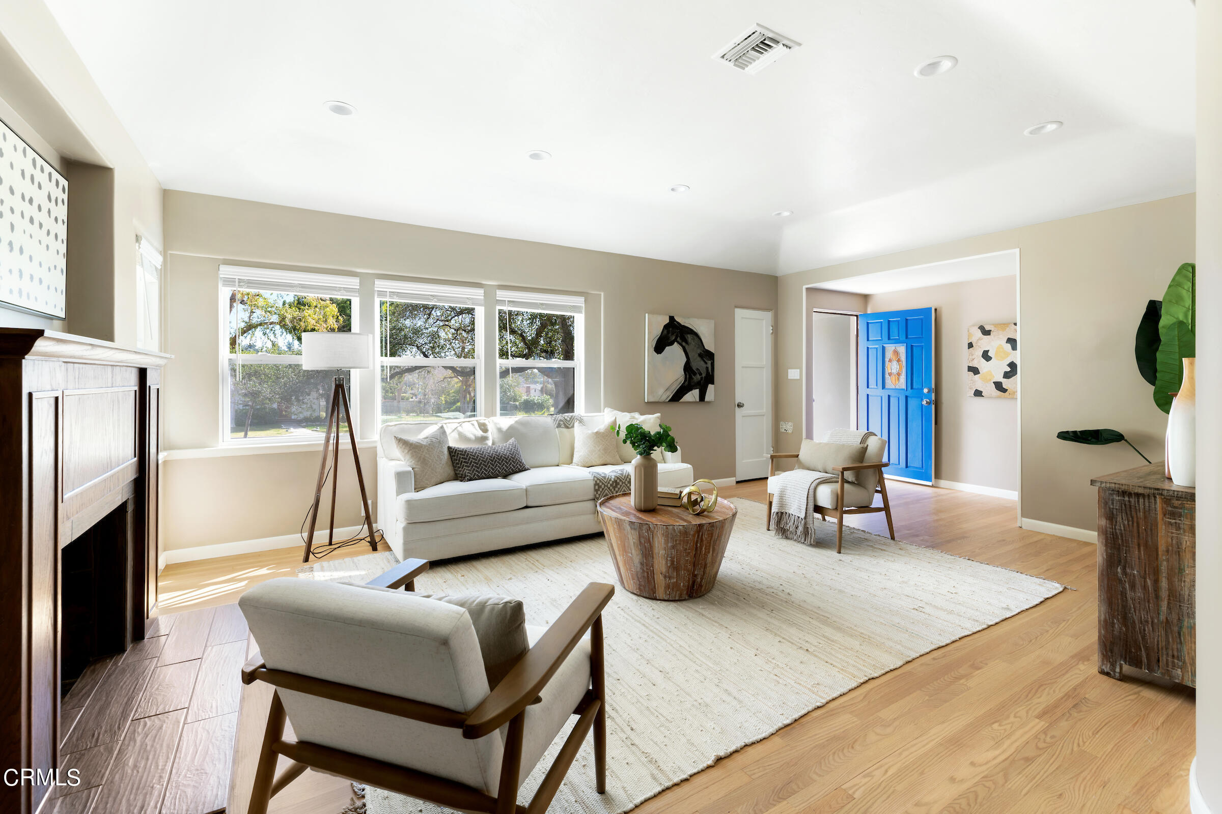 1673 Coolidge Avenue Altadena, CA 91001 - Photo 11 of 59 a living room with furniture a large window and a flat screen tv