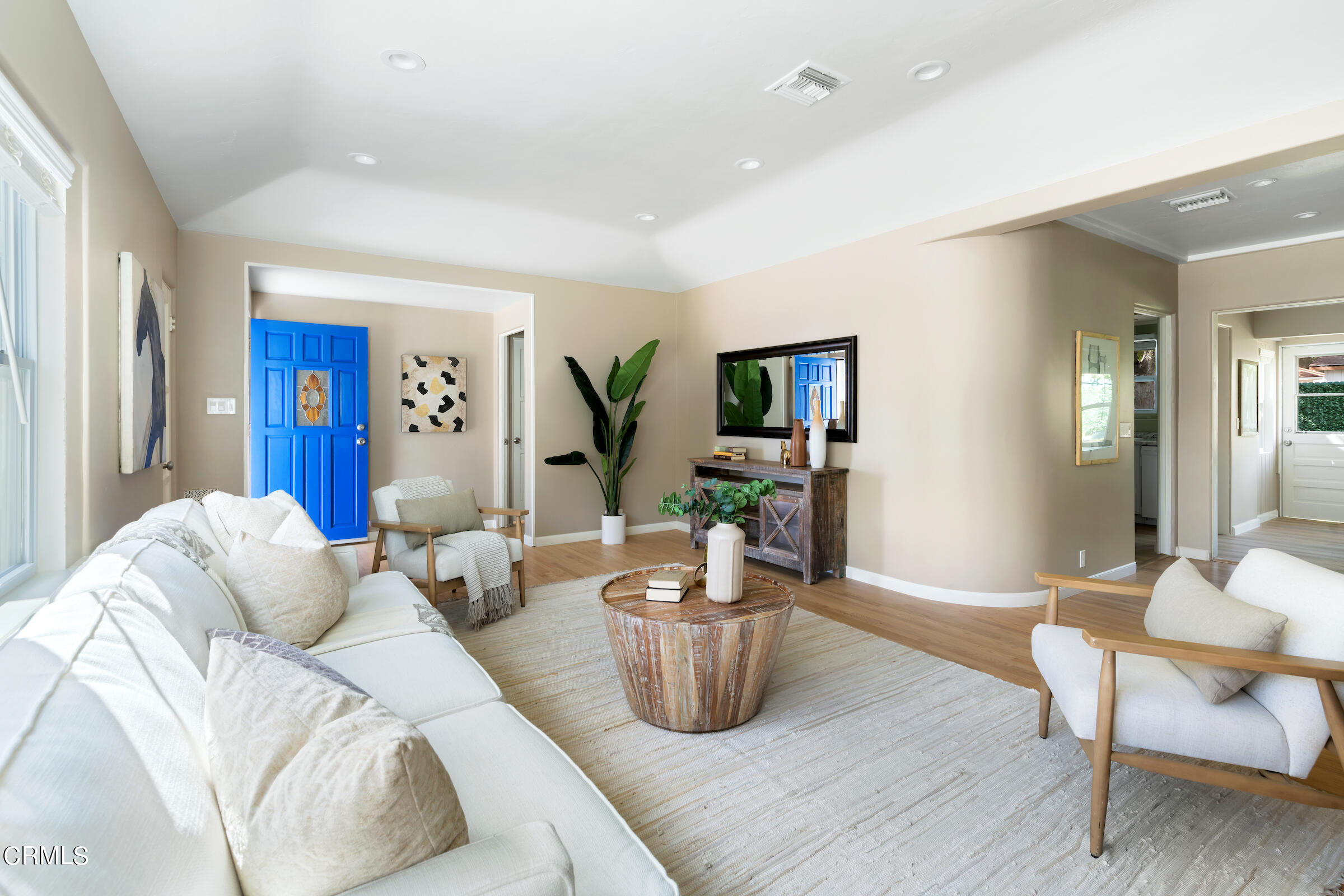 1673 Coolidge Avenue Altadena, CA 91001 - Photo 13 of 59 a living room with furniture and a wooden floor