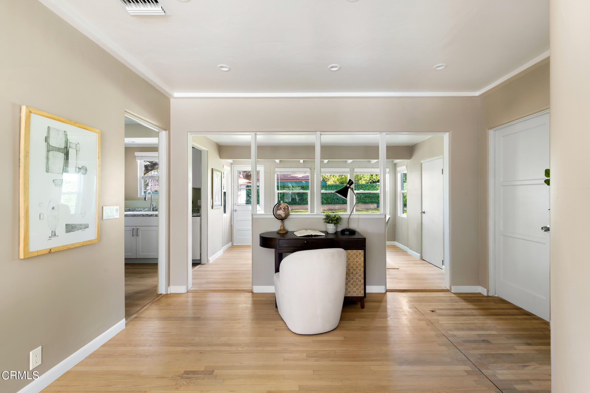 1673 Coolidge Avenue Altadena, CA 91001 - Photo 15 of 59 a living room with furniture floor to ceiling window and wooden floor