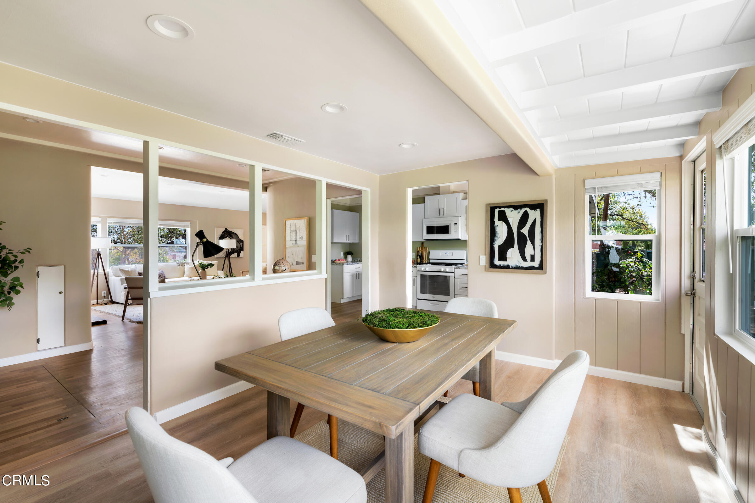 1673 Coolidge Avenue Altadena, CA 91001 - Photo 19 of 59 a view of a dining room with furniture and wooden floor