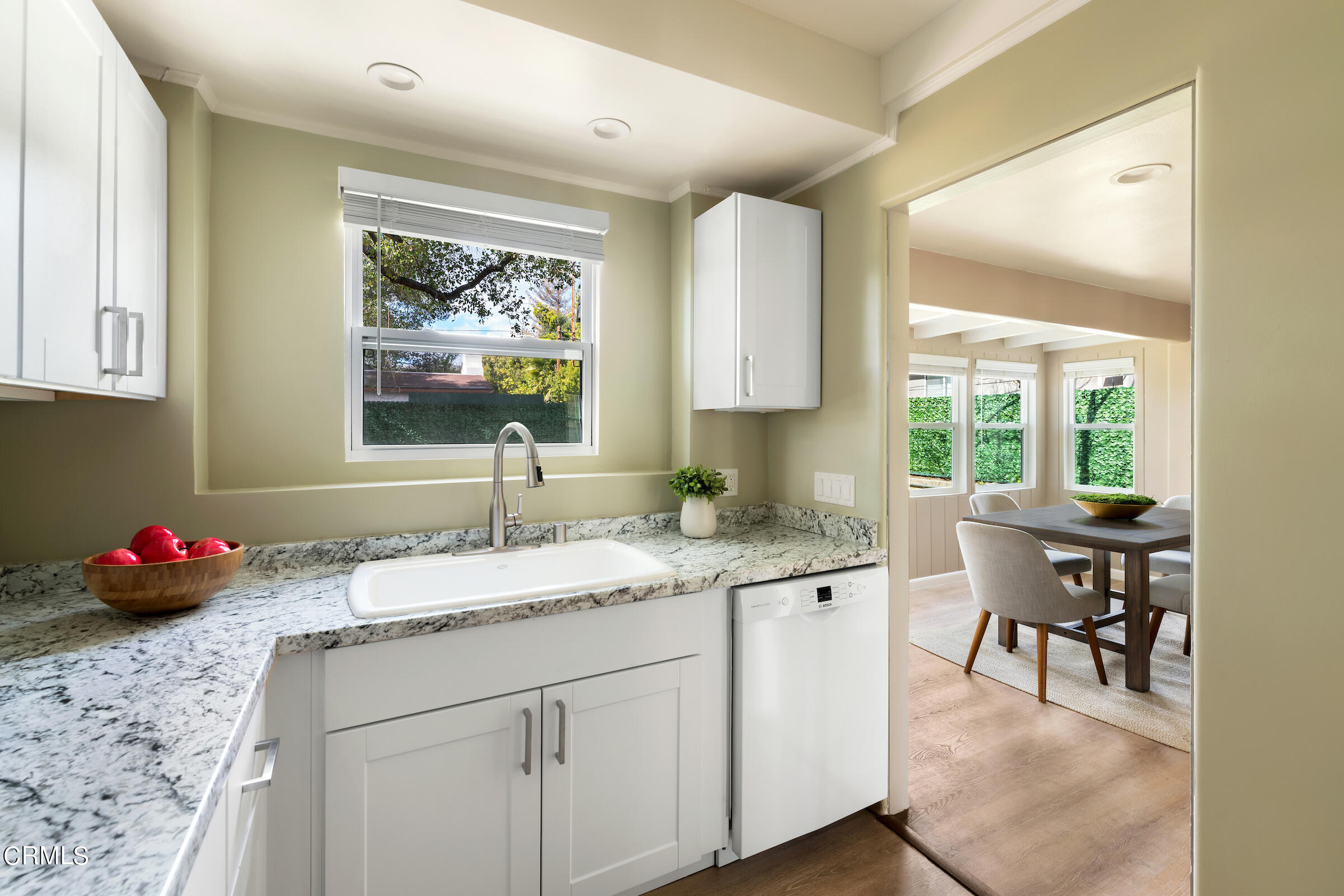 1673 Coolidge Avenue Altadena, CA 91001 - Photo 24 of 59 a kitchen with a sink cabinets and a window