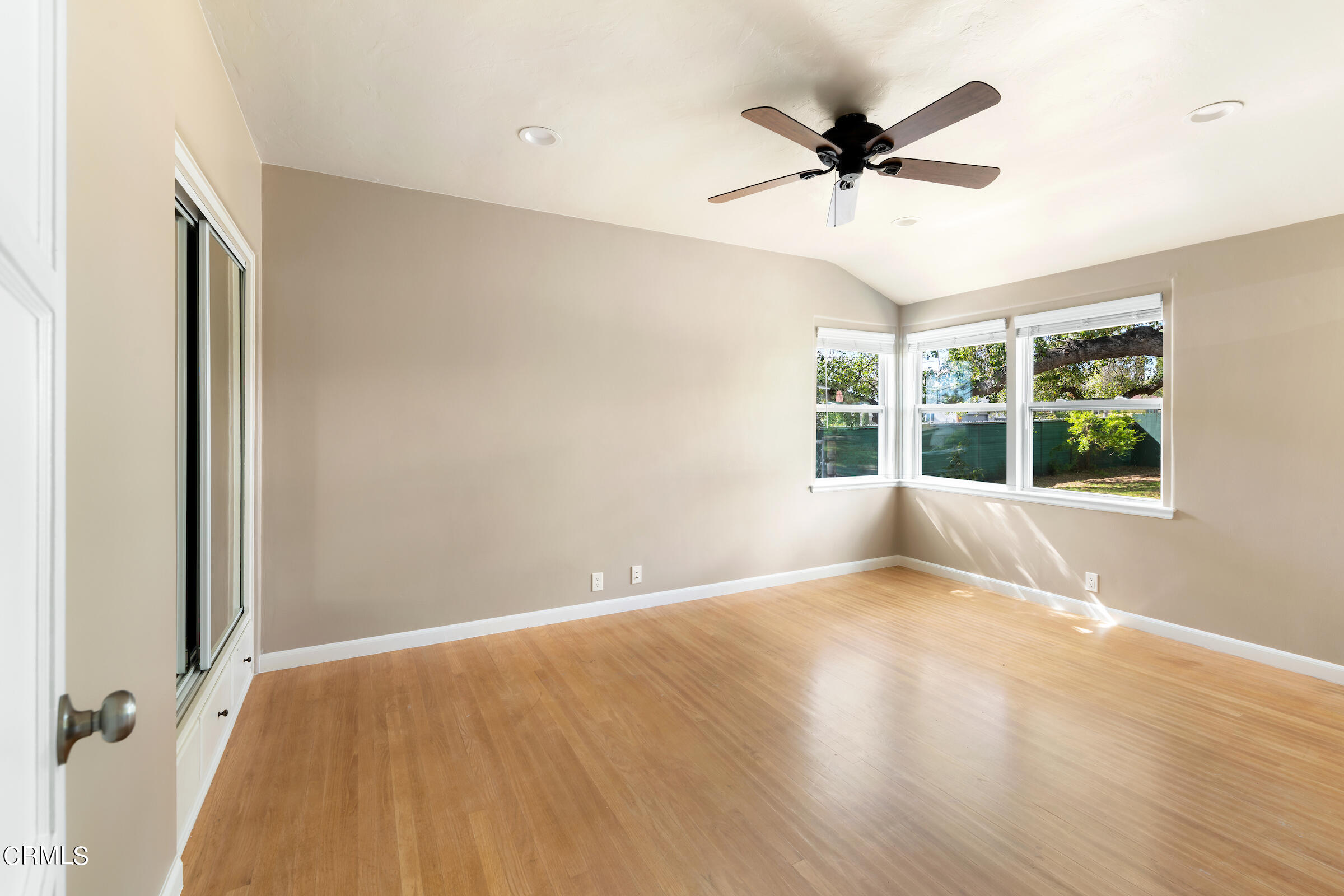 1673 Coolidge Avenue Altadena, CA 91001 - Photo 25 of 59 wooden floor in an empty room with a window