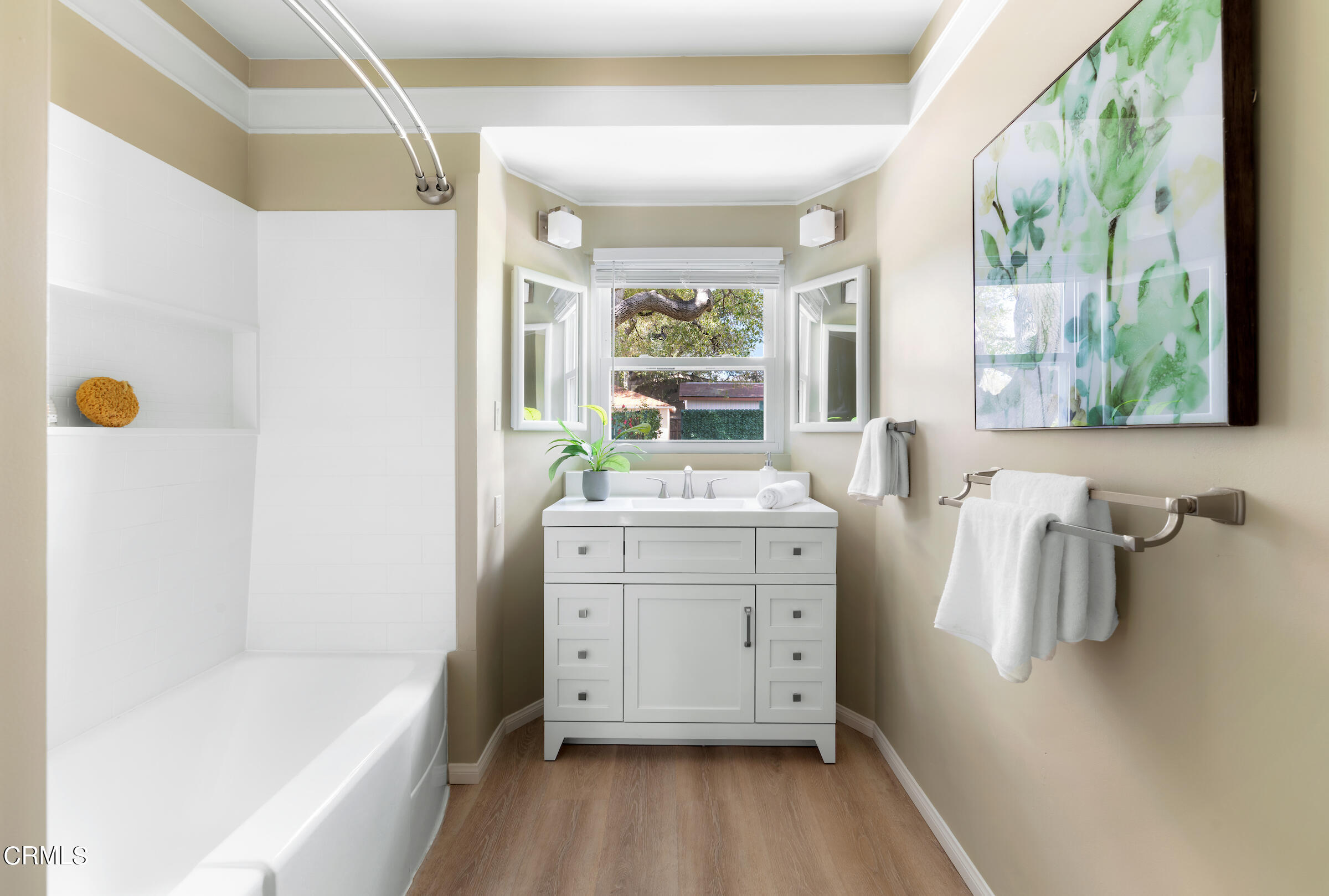 1673 Coolidge Avenue Altadena, CA 91001 - Photo 27 of 59 a bathroom with a tub sink and mirror