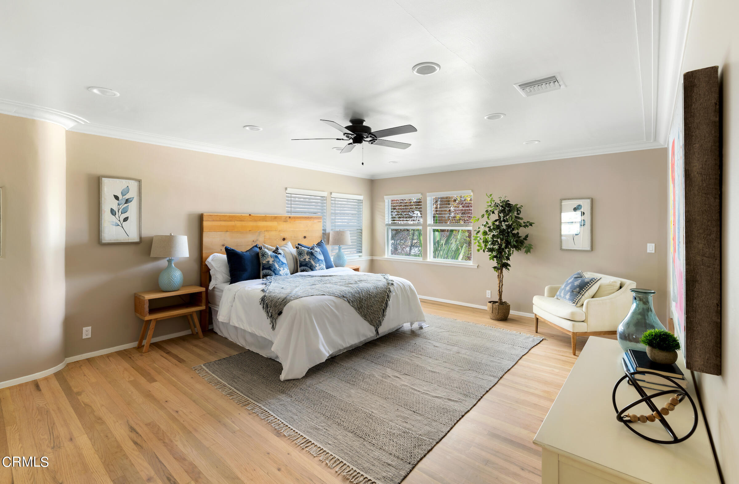 1673 Coolidge Avenue Altadena, CA 91001 - Photo 29 of 59 a bedroom with a bed couches and a potted plant