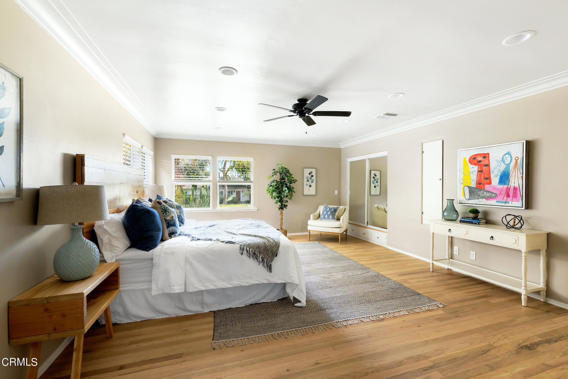 1673 Coolidge Avenue Altadena, CA 91001 - Photo 30 of 59 a spacious bedroom with a bed and glass table