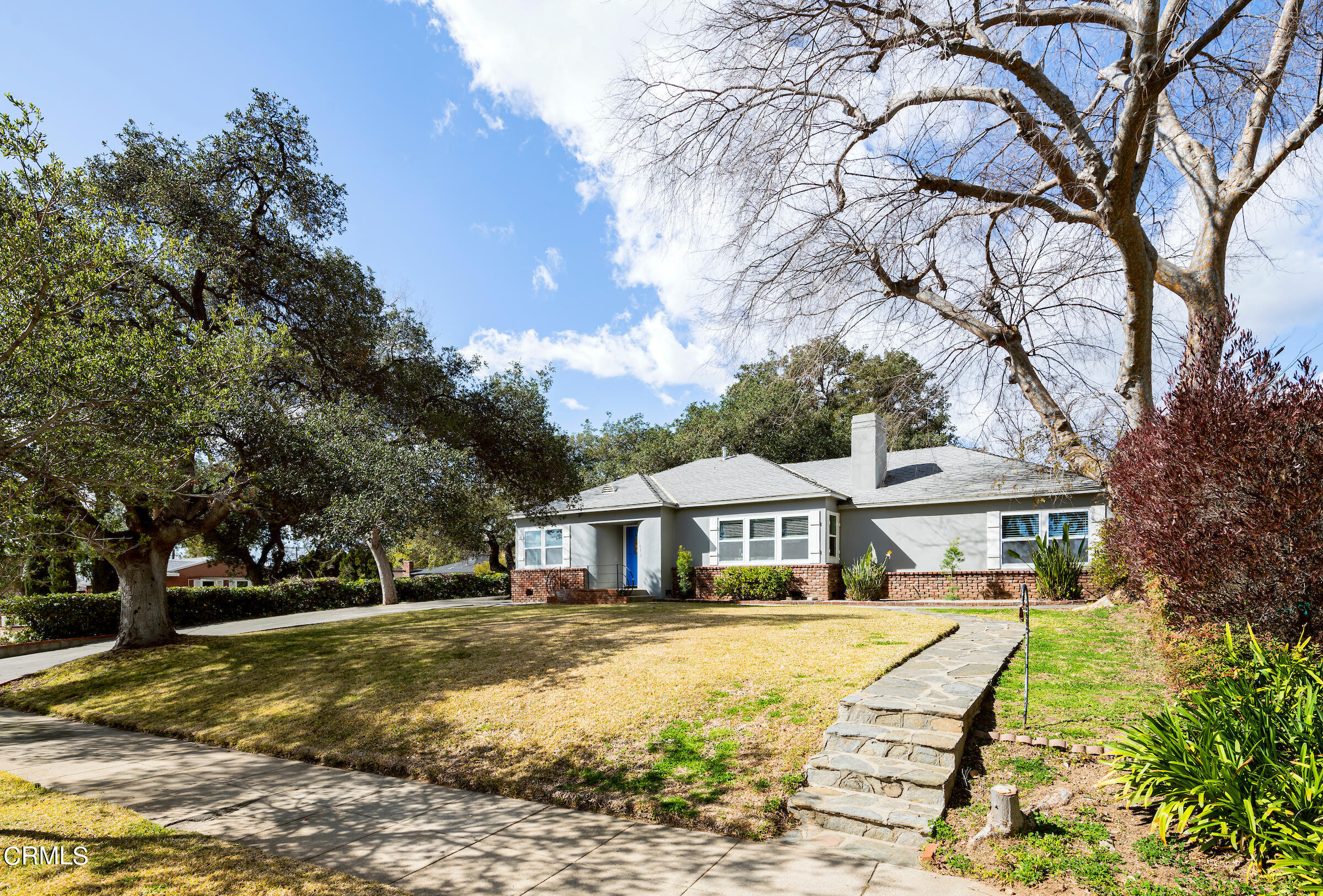 1673 Coolidge Avenue Altadena, CA 91001 - Photo 3 of 59 a front view of a house with a yard