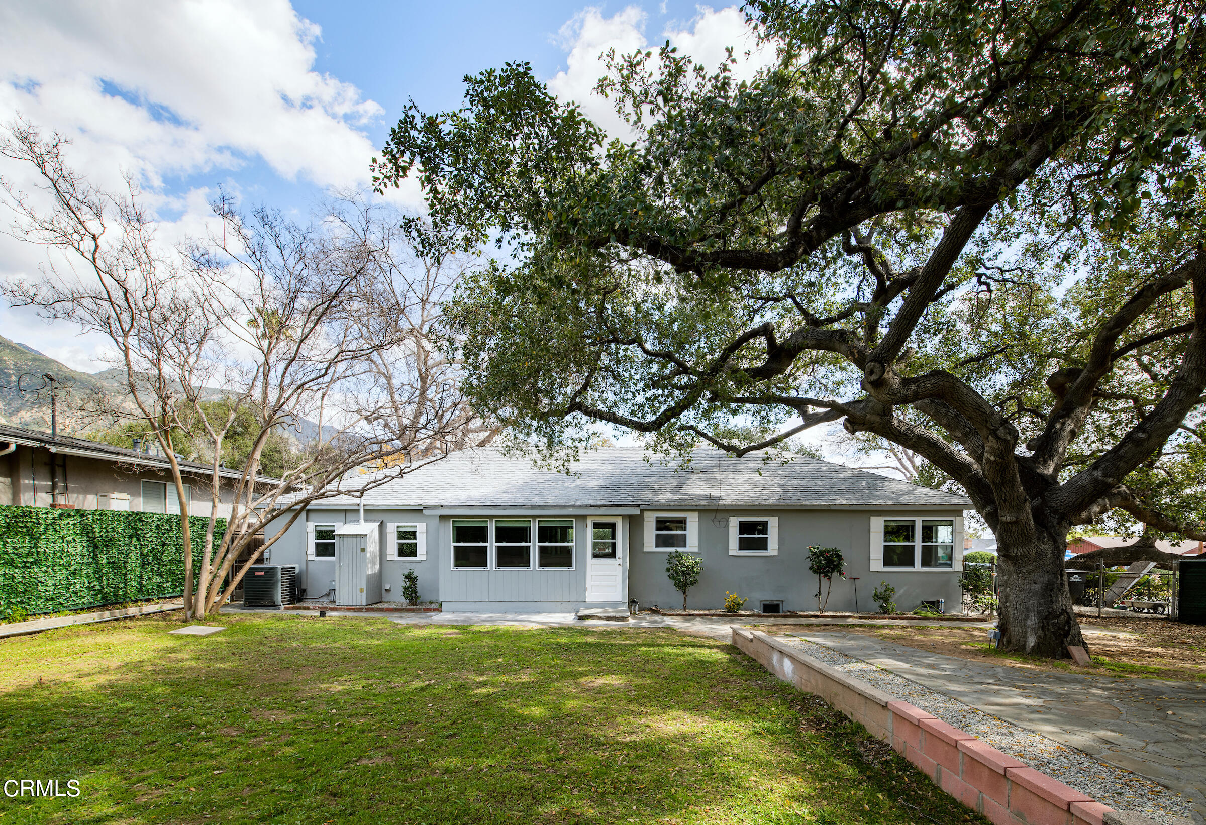 1673 Coolidge Avenue Altadena, CA 91001 - Photo 46 of 59 a front view of a house with a garden