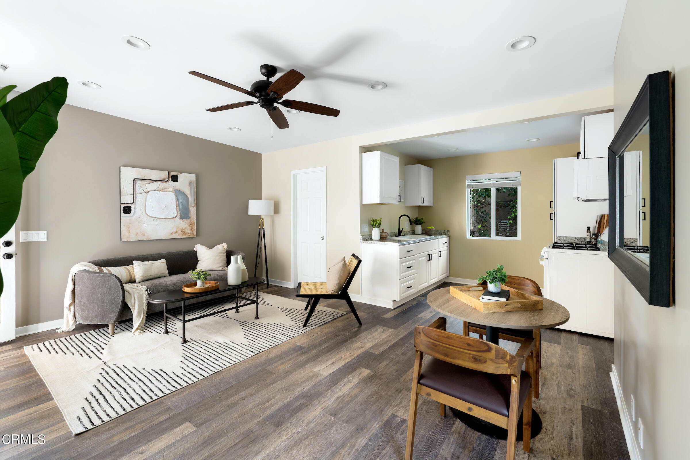 1673 Coolidge Avenue Altadena, CA 91001 - Photo 54 of 59 a living room with furniture and a wooden floor