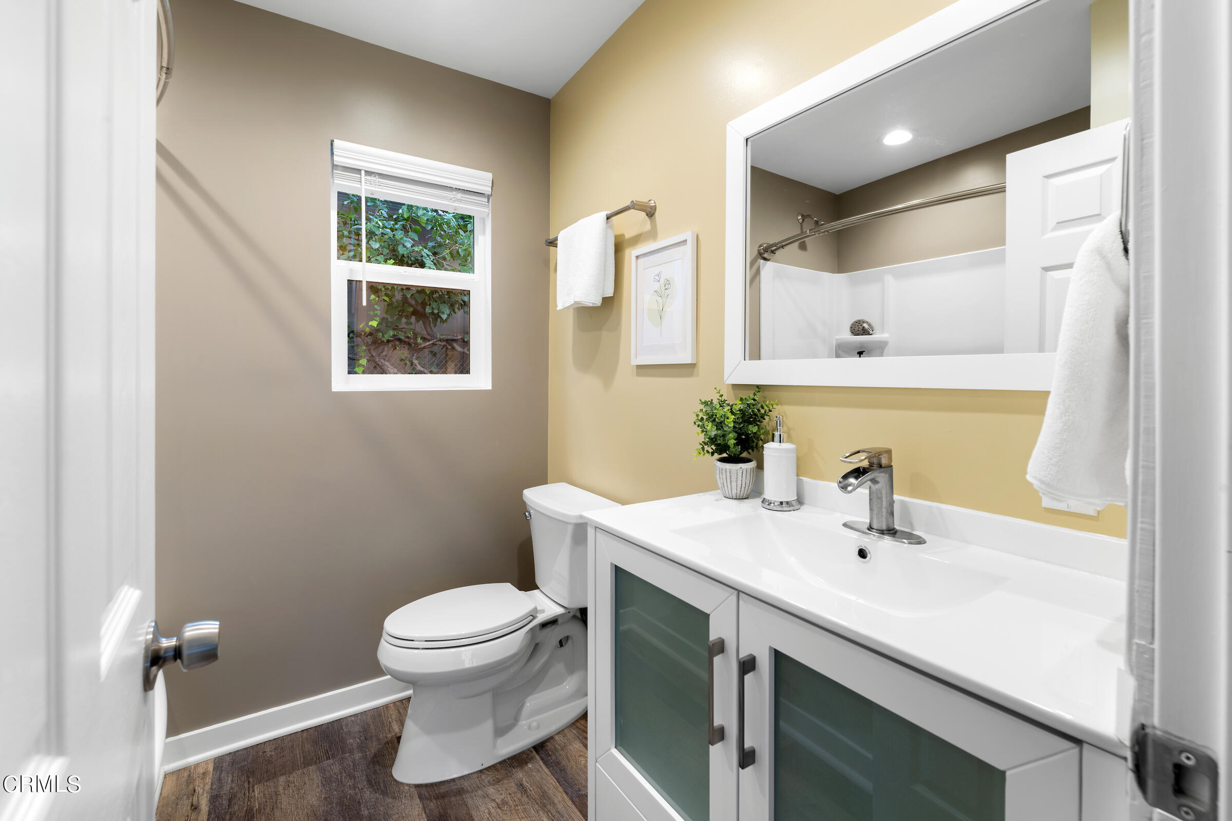 1673 Coolidge Avenue Altadena, CA 91001 - Photo 59 of 59 a bathroom with a sink toilet and a mirror