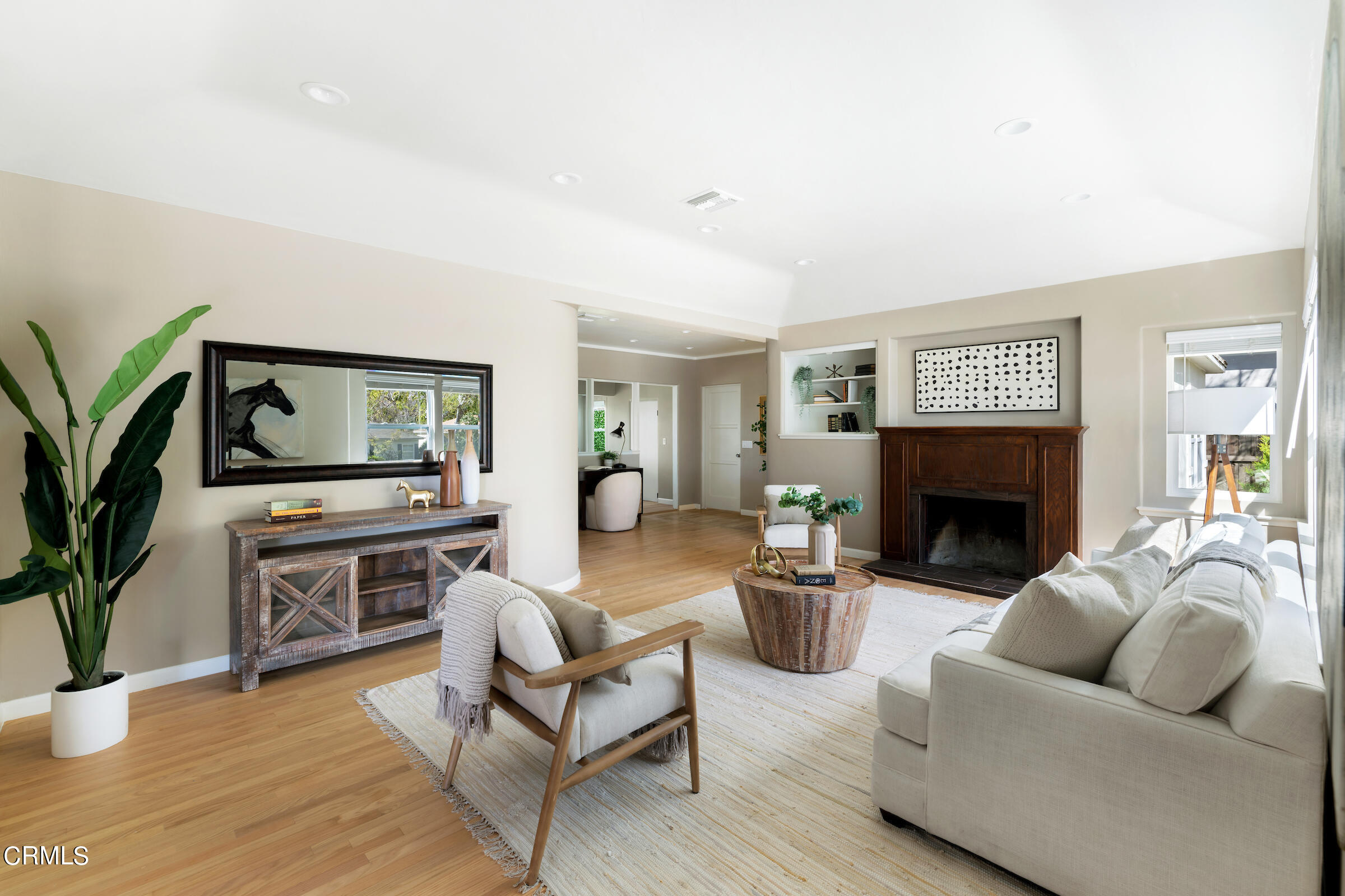 1673 Coolidge Avenue Altadena, CA 91001 - Photo 9 of 59 a living room with furniture and a fireplace