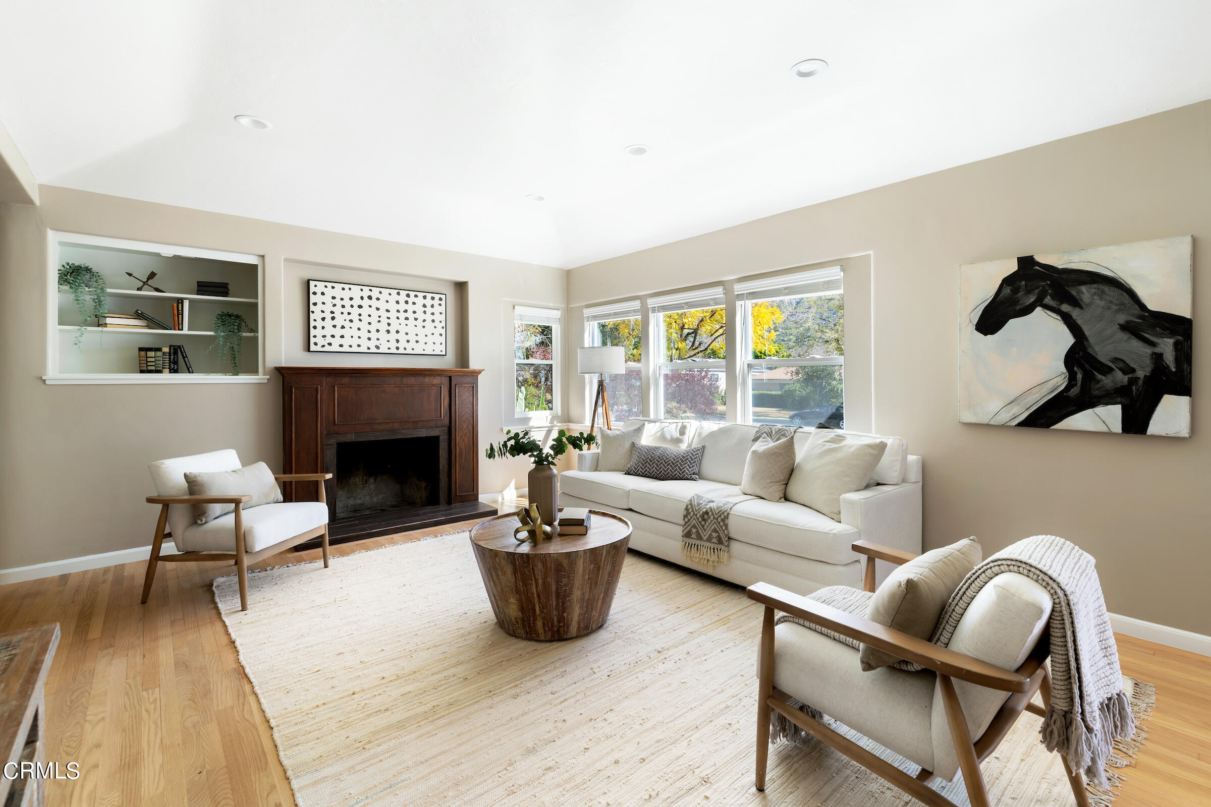 1673 Coolidge Avenue Altadena, CA 91001 - Photo 10 of 59 a living room with furniture and a fireplace