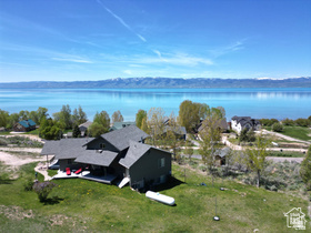 1940 East Shore Road St. Charles, ID 83272 - Photo 62 of 64 Aerial view of property and surrounding area with a nearby body of water