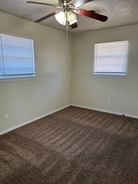 1636 58th Street, Unit B Lubbock, TX 79412 - Photo 8 of 8 a view of an empty room with a window