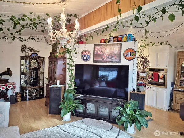 a room with fireplace and flowers