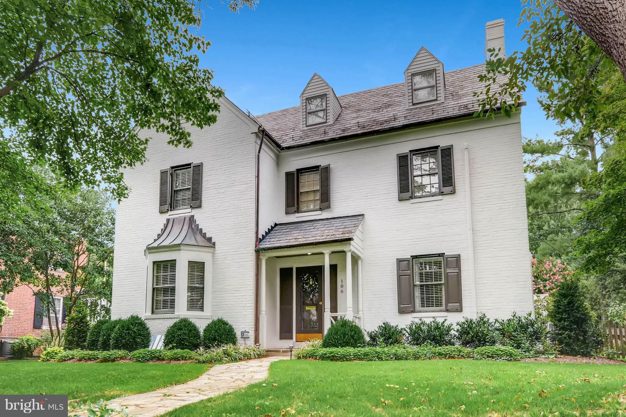 106 Enfield Road Baltimore, MD 21212 - Photo 1 of 27 a front view of a house with garden
