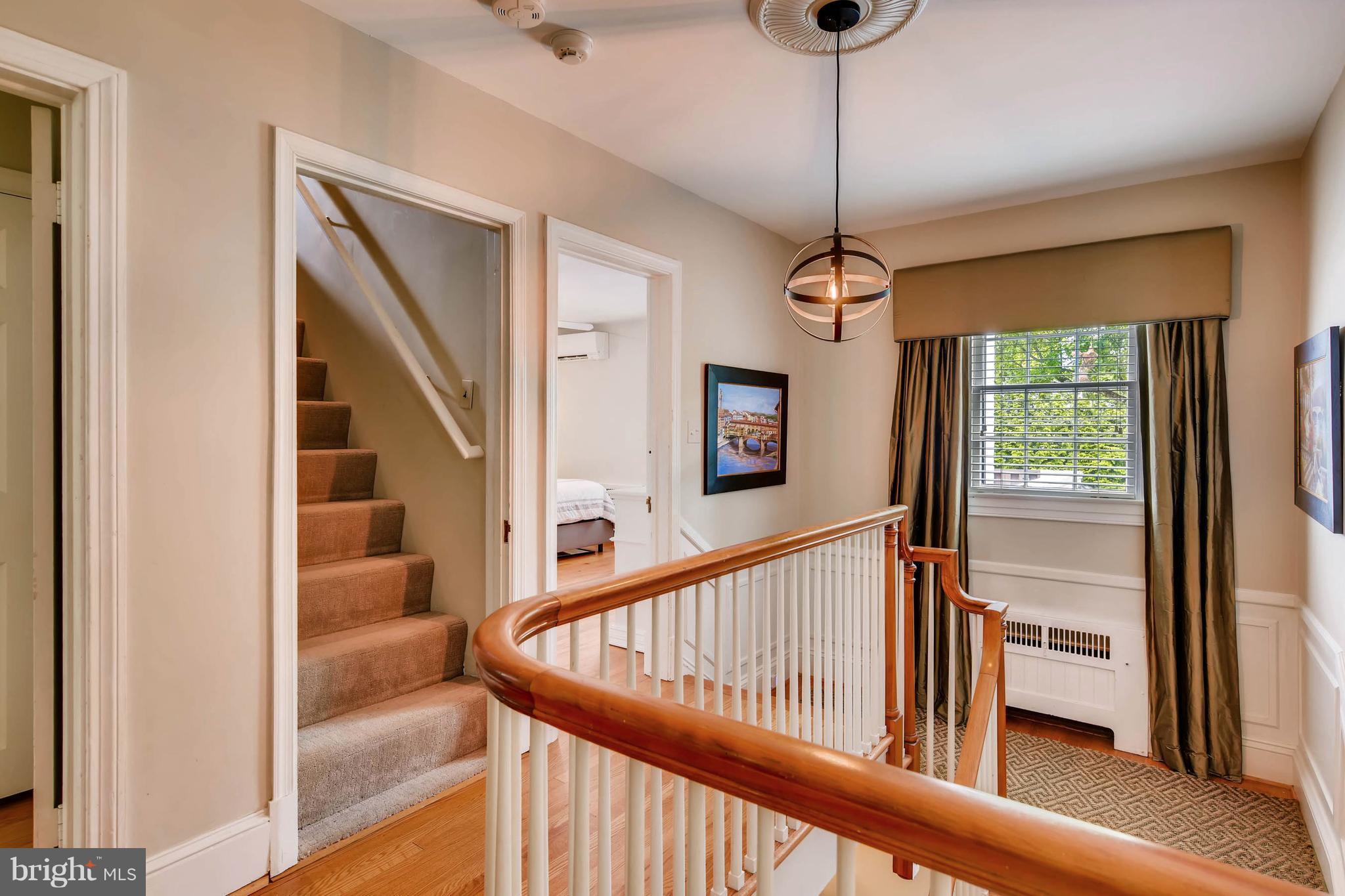 106 Enfield Road Baltimore, MD 21212 - Photo 12 of 27 a view of a hallway to window