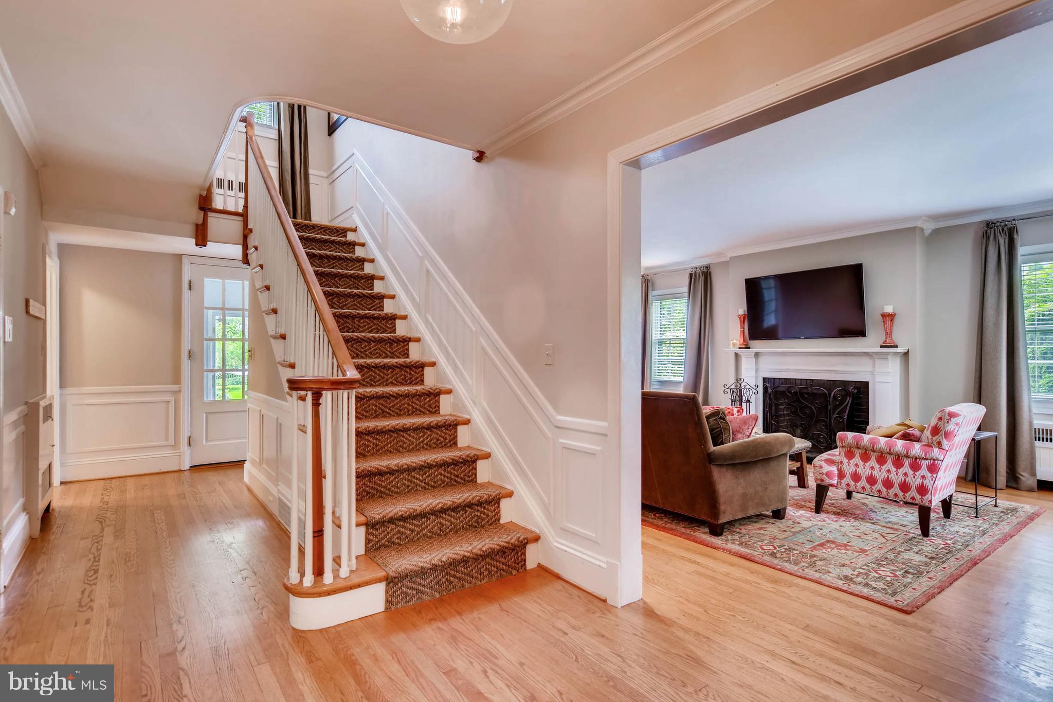 106 Enfield Road Baltimore, MD 21212 - Photo 3 of 27 a living room with furniture and a fireplace
