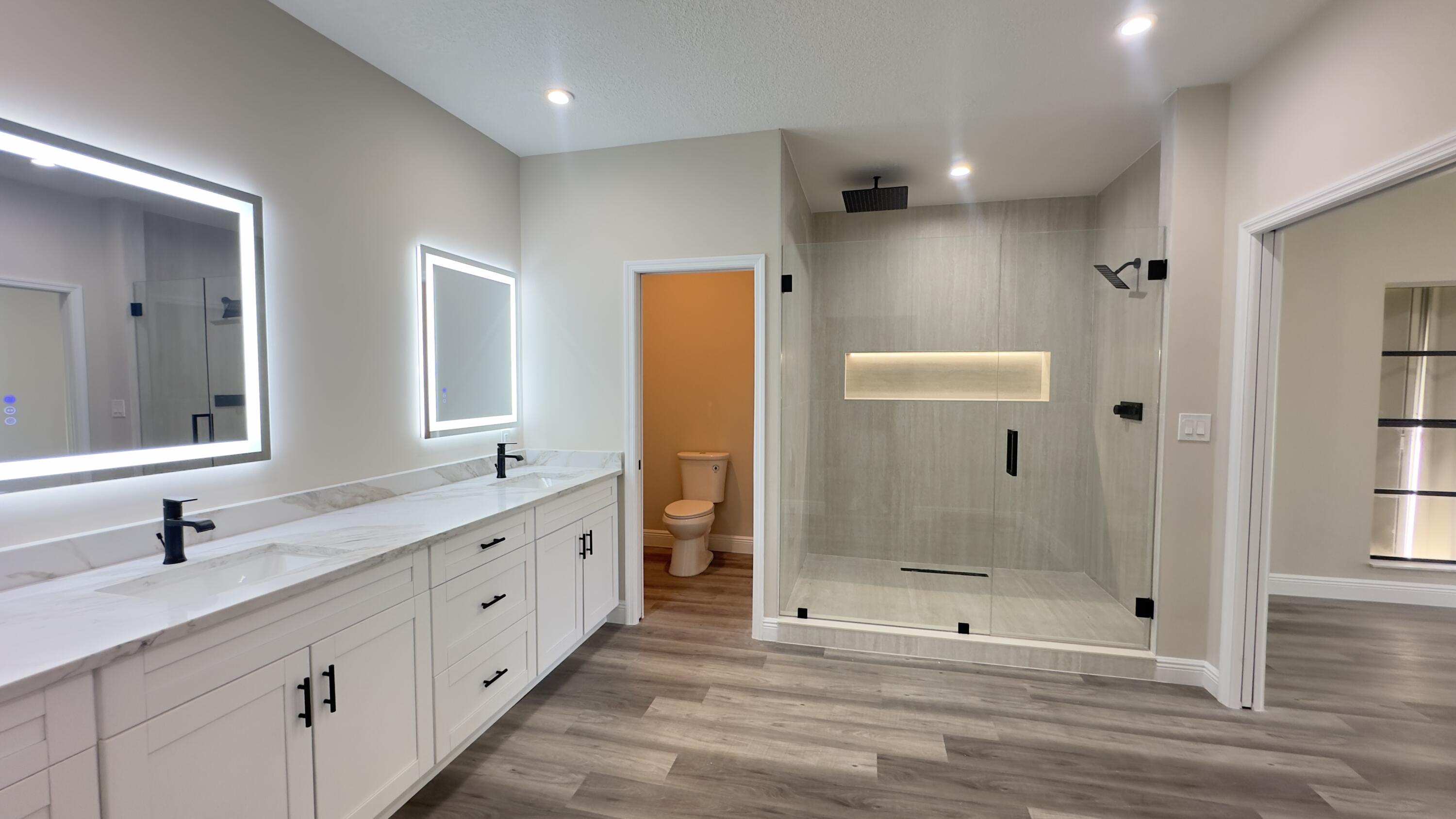 11330 Timber Lodge Terrace Boca Raton, FL 33428 - Photo 18 of 23 a bathroom with double sink and shower