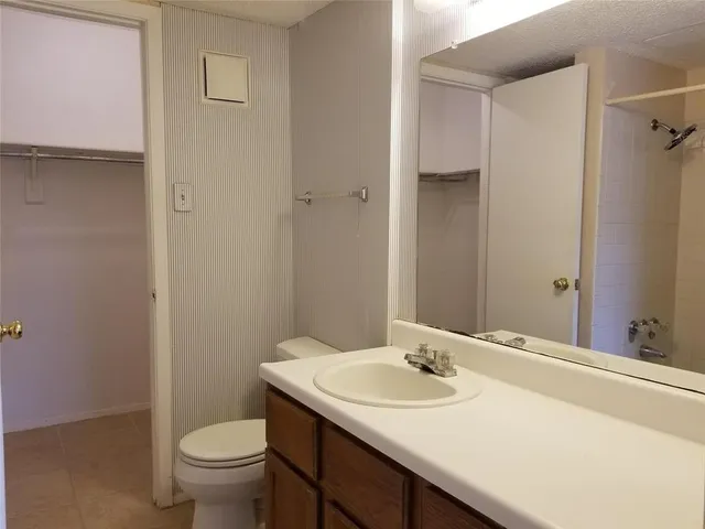 a bathroom with a sink and a toilet