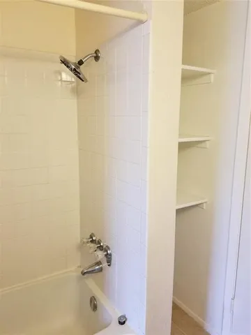 a bathroom with a bathtub