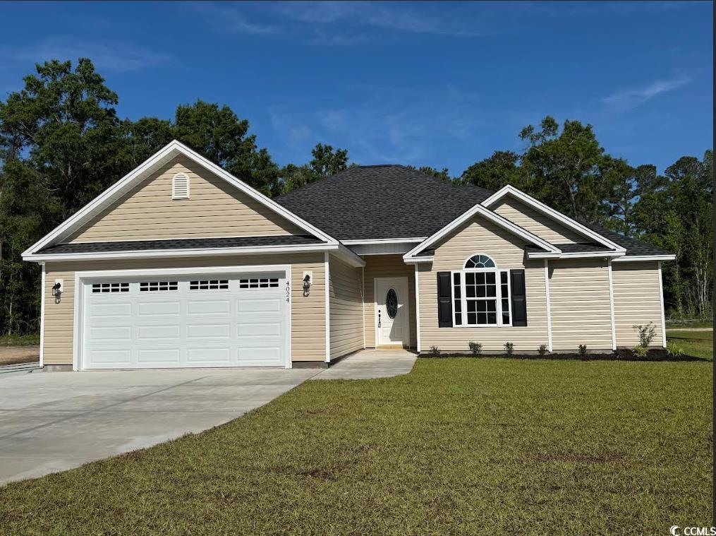 4024 Copperhead Road Conway, SC 29527 - Photo 1 of 15 Single story home featuring roof with shingles, an