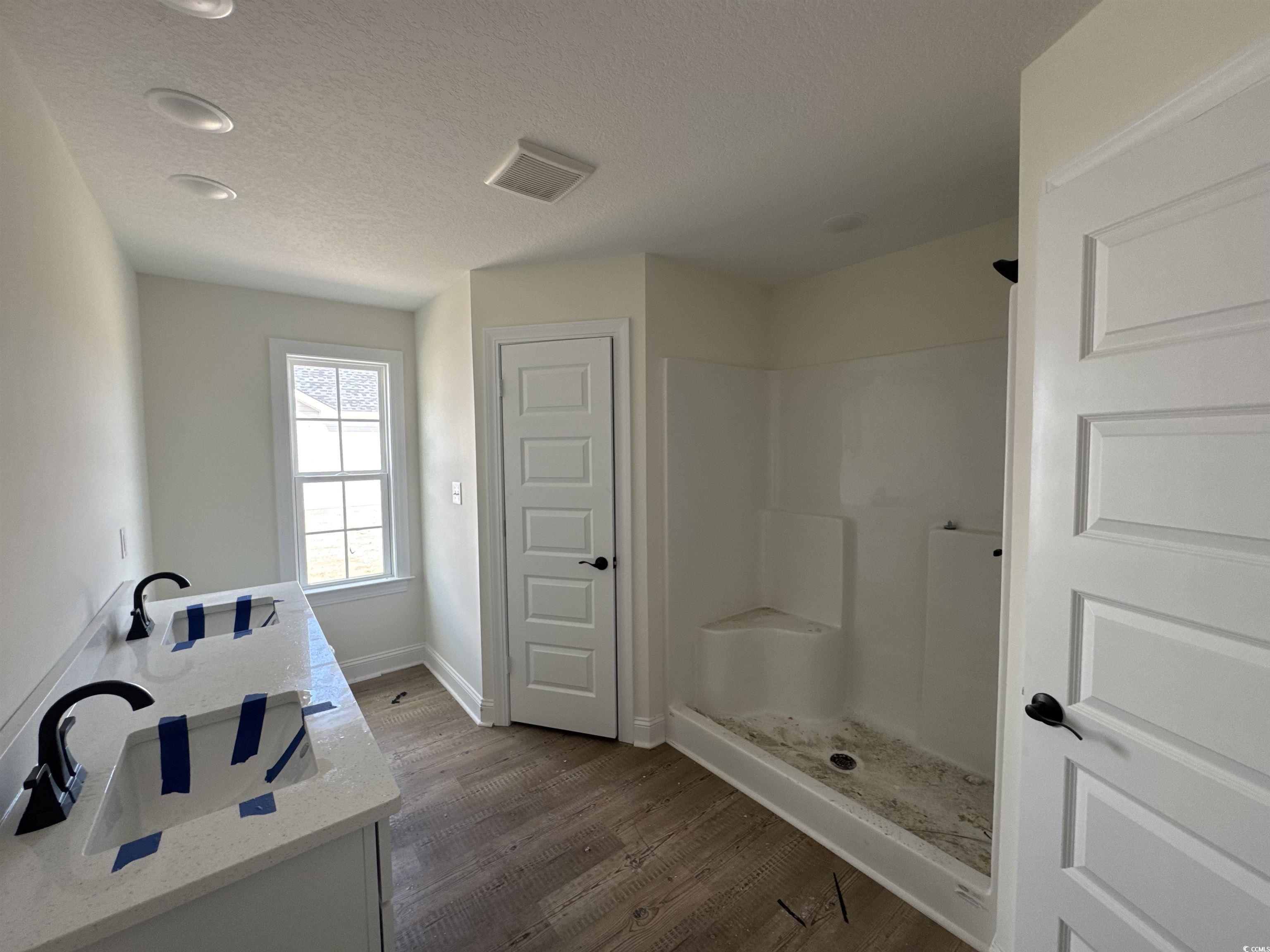 4024 Copperhead Road Conway, SC 29527 - Photo 12 of 15 Full bathroom featuring a textured ceiling, basebo