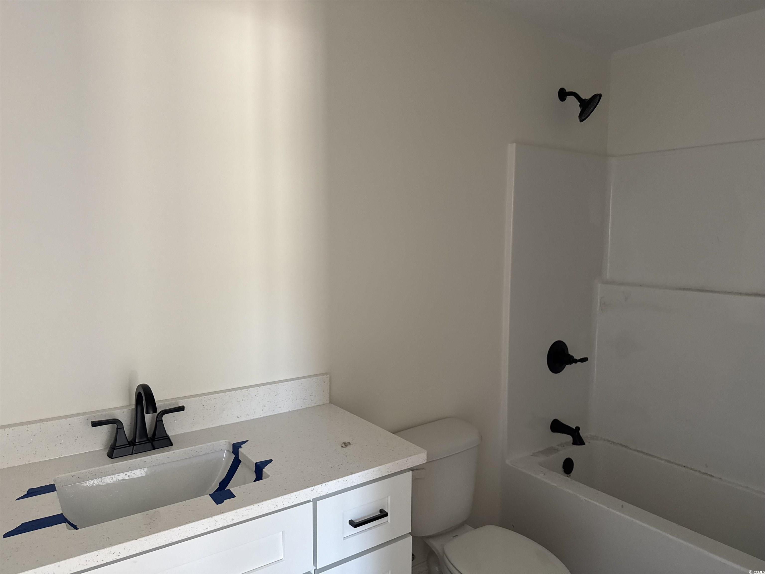 4024 Copperhead Road Conway, SC 29527 - Photo 15 of 15 Bathroom with shower / bath combination, toilet, a
