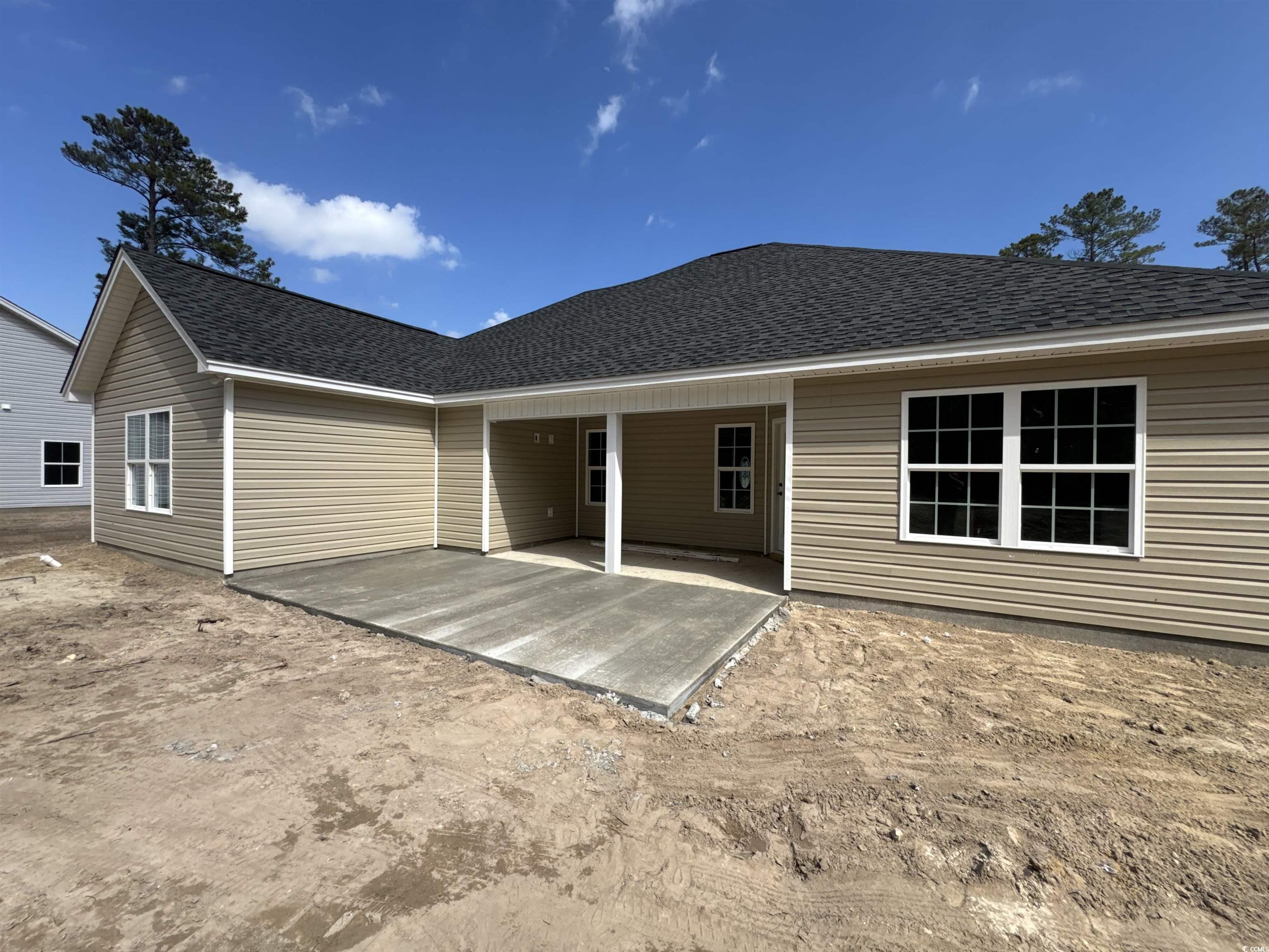 4024 Copperhead Road Conway, SC 29527 - Photo 4 of 15 Rear view of property with a shingled roof and a p
