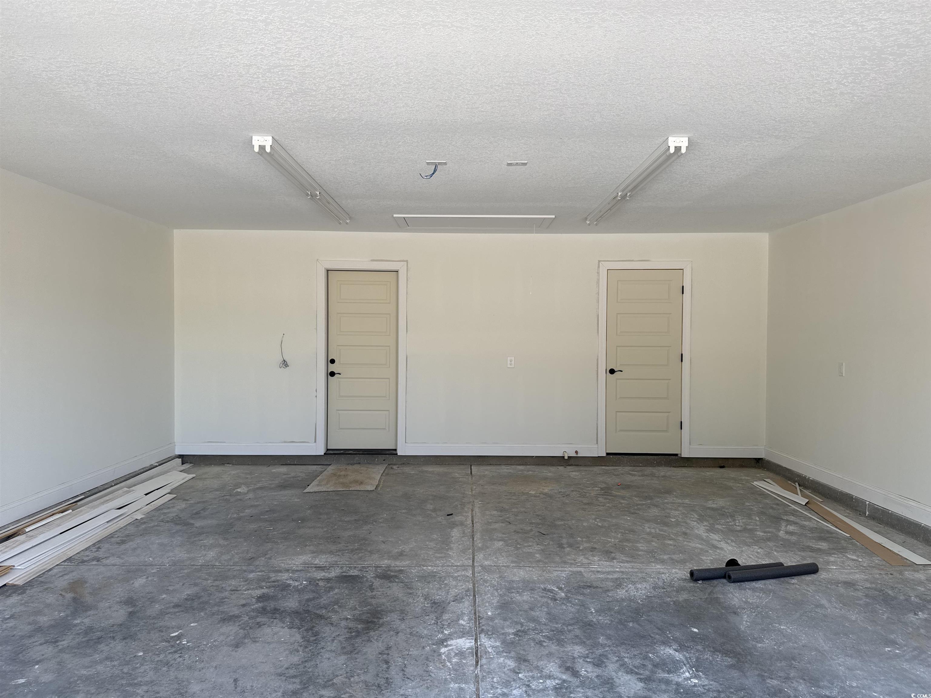 4024 Copperhead Road Conway, SC 29527 - Photo 6 of 15 Garage featuring baseboards