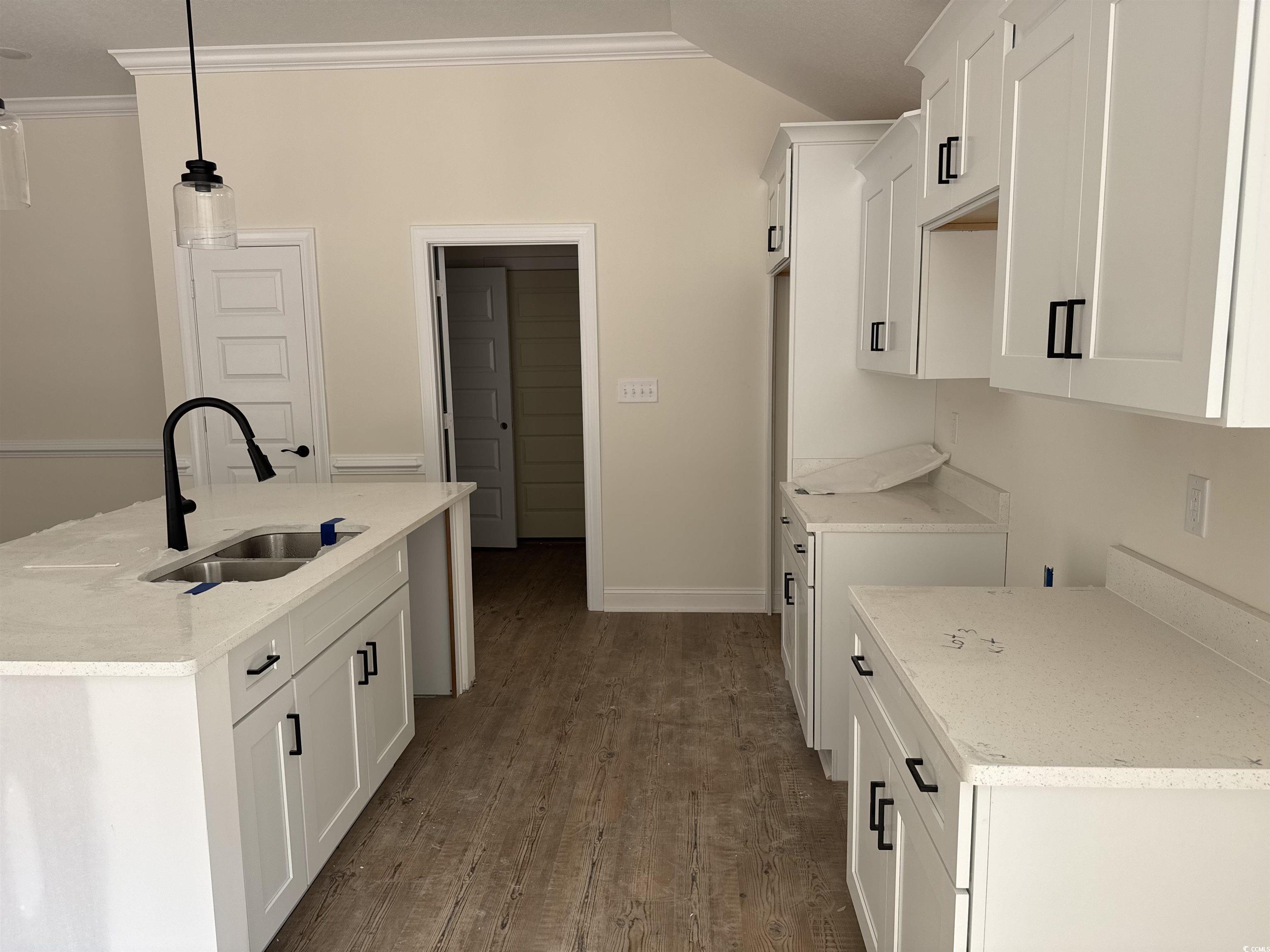 4024 Copperhead Road Conway, SC 29527 - Photo 9 of 15 Kitchen featuring crown molding, dark wood-style f