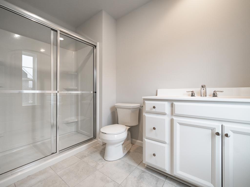 3106 Tulane Way Bridgeville, PA 15017 - Photo 15 of 25 a bathroom with a sink toilet and shower