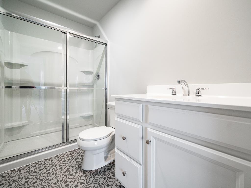 3106 Tulane Way Bridgeville, PA 15017 - Photo 20 of 25 a bathroom with a toilet and a shower