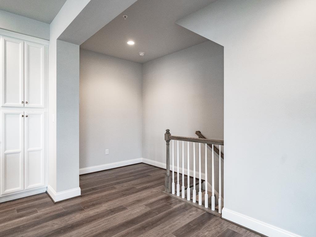 3106 Tulane Way Bridgeville, PA 15017 - Photo 23 of 25 a view of a hallway with wooden floor