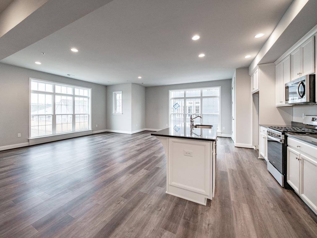 3106 Tulane Way Bridgeville, PA 15017 - Photo 5 of 25 an empty room with wooden floor and windows