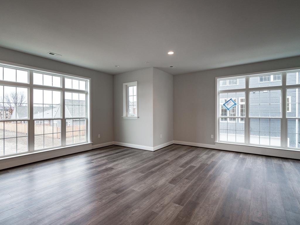 3106 Tulane Way Bridgeville, PA 15017 - Photo 10 of 25 a view of an empty room with wooden floor and a window